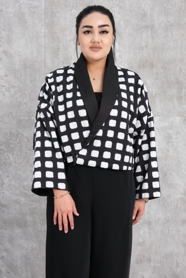  This womens jacket is in anthracite color. The jacket seen on the model catches the eye with its square patterns and offers a modern look. Available in sizes S, M, and L. The fabric composition is 65% viscose and 35% polyester, which ensures a comfortable wearing experience.