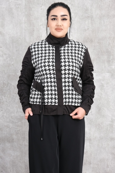  This womens jacket stands out with its stylish and modern design. The jacket is eye-catching with its white color and black-and-white houndstooth pattern. It features two functional pockets on the front. The jacket has long sleeves with a slightly ruched design. The high collar detail keeps you warm in cold weather. The fabric content of the product is 65% viscose and 35% polyester. It is available in sizes S, M, and L.