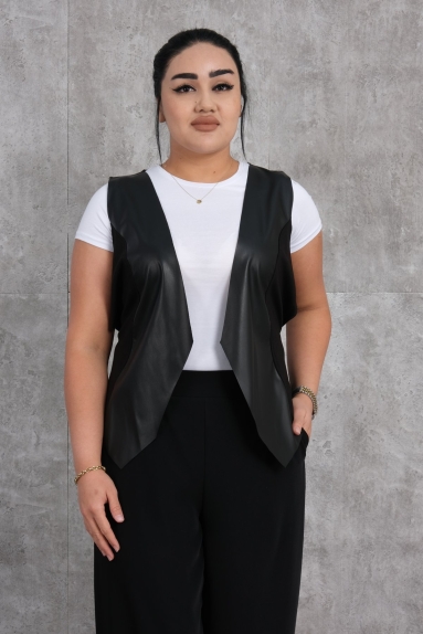 The product is a stylish and modern womens vest worn by the model. This black-colored vest offers a simple and elegant look. The vest comes in size options of S, M, and L, accommodating different body types. It is made from a fabric content of 65% viscose and 35% polyester, making it both comfortable and durable. The vest features chic and asymmetrical cutting details on the front, and it is completed with tie details on the back, ensuring a perfect fit to the body.
