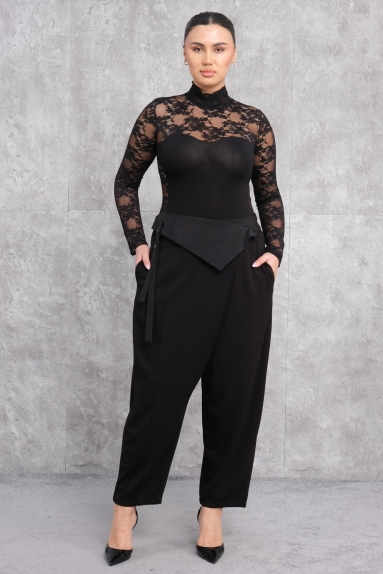  This elegant womens trousers come in black and are available in various sizes (S, M, L, XL). With a fabric composition of 80% viscose, 15% polyester, and 5% elastane, this product stands out for its comfort and durability. The design, displayed gracefully on the model, features detailed stripes at the front, adding a sophisticated look. Suitable for both daily wear and special occasions, these trousers are set to be a staple piece in any wardrobe.
