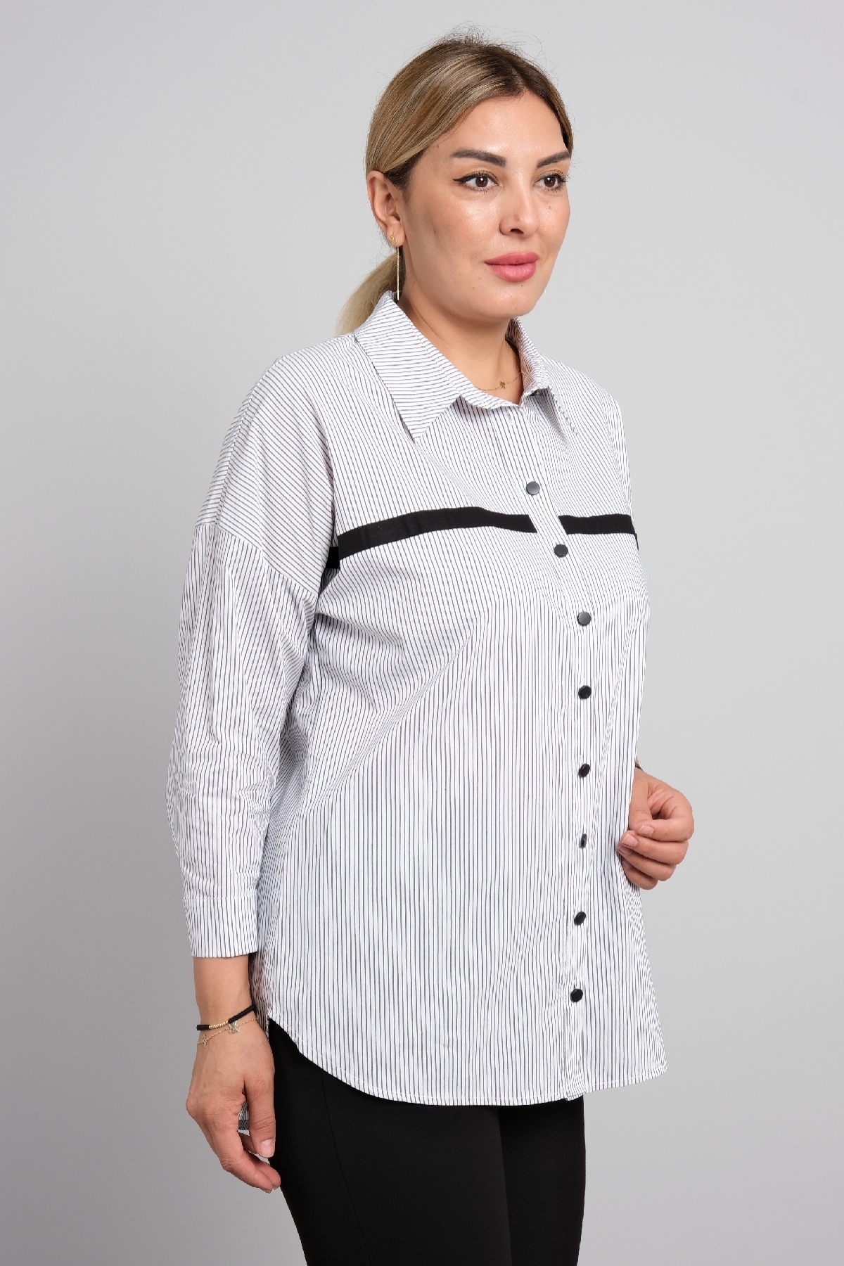 Classic big size women's shirt with long sleeves and stripes.