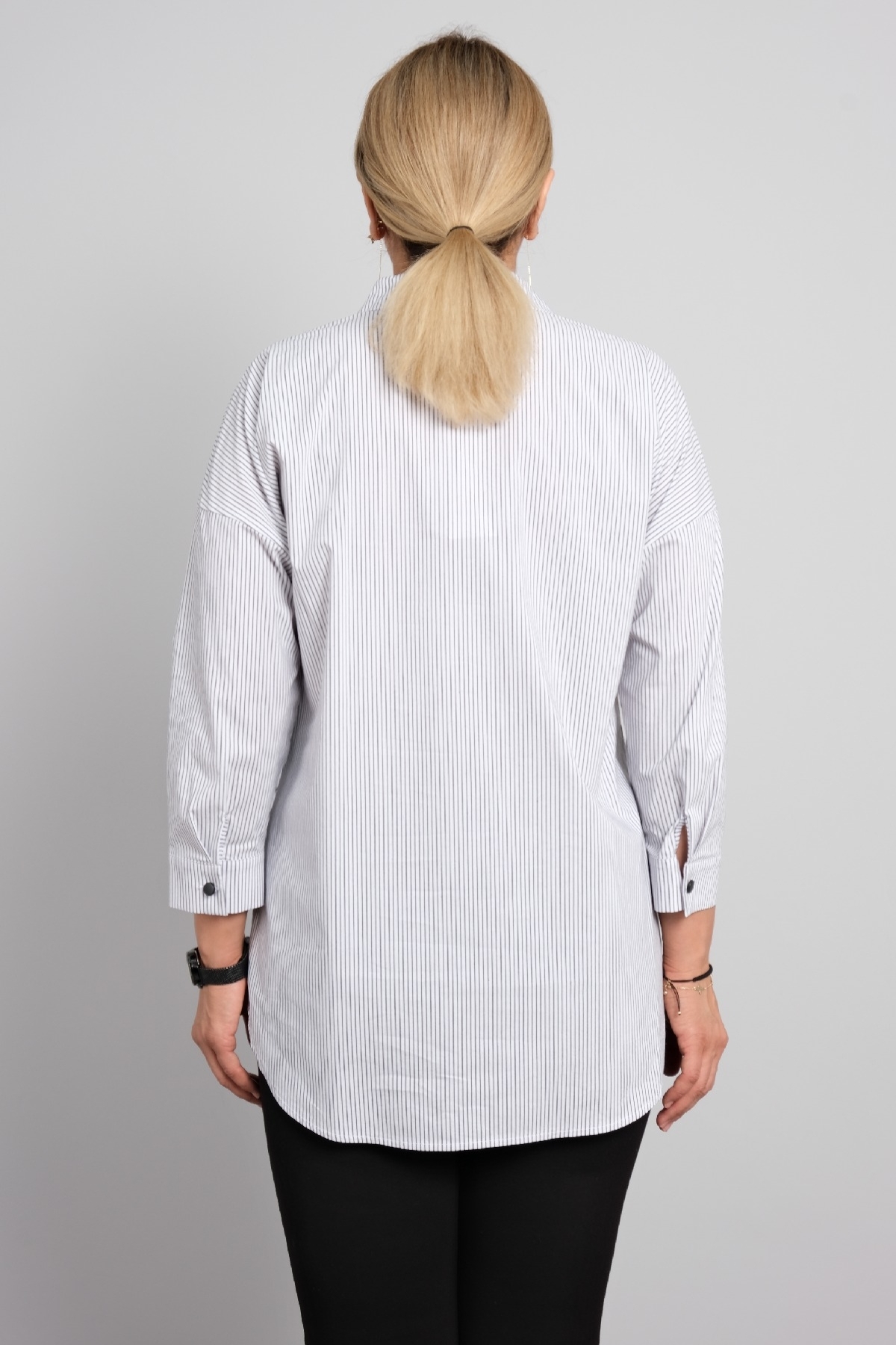Classic big size women's shirt with long sleeves and stripes.