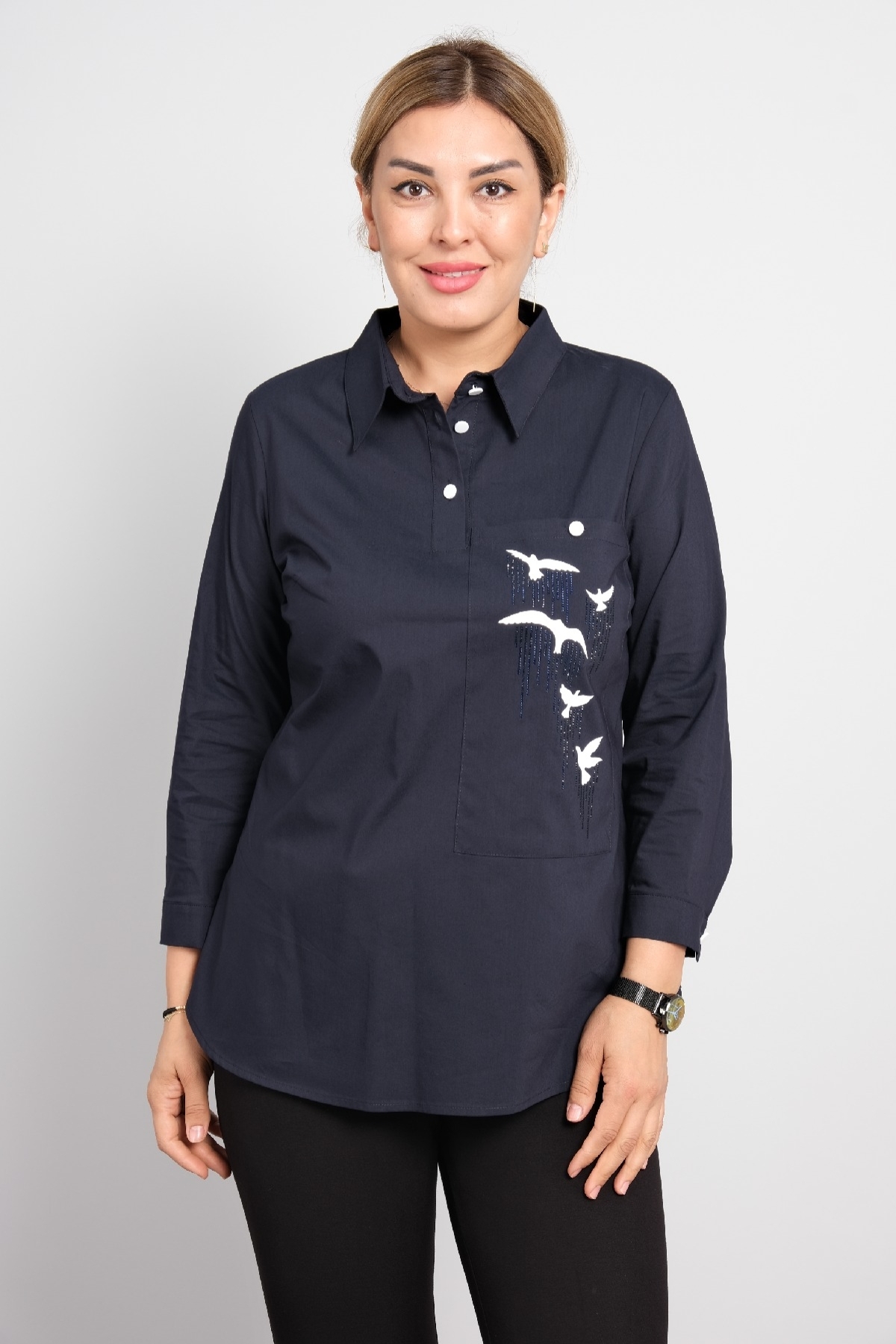 Womens polo shirt with long sleeves in big sizes. Stylish sports shirt with bird print.