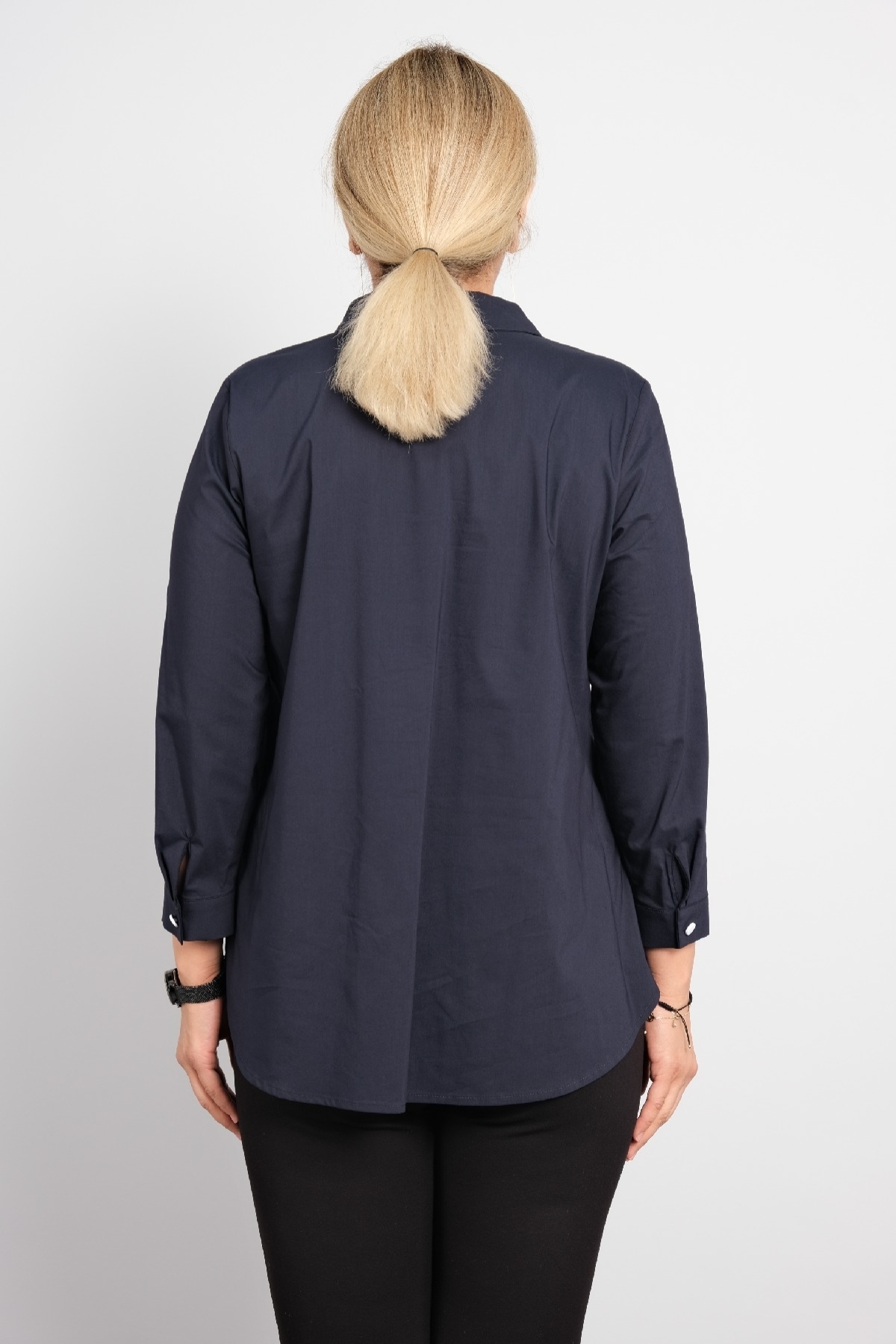 Womens polo shirt with long sleeves in big sizes. Stylish sports shirt with bird print.