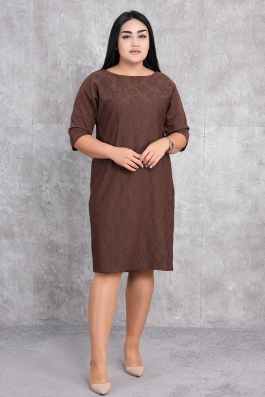  This elegant plus size women’s dress is perfect for both daily wear and special events. With its brown color, it offers a sophisticated look, combining comfort and style. The dress is available in sizes 42, 44, 46, and 48. The fabric composition is 65% cotton, 30% polyester, and 5% elastane, ensuring long-lasting comfort and durability. The front and back views of the dress highlight its soft texture and comfortable cut, providing the wearer with a comfortable wearing experience.