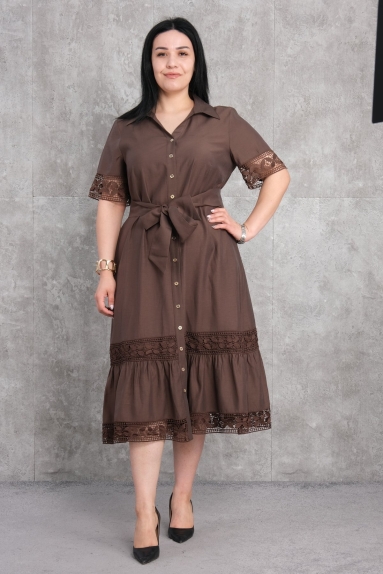  This product is a plus-size womens dress in brown color. The available sizes are 50, 52, 54, and 56. The dress is made of 100% polyester fabric. It features button details on the front and lace embellishments on the sleeves and hem. It has a belt that ties at the waist, providing a perfect fit and stylish appearance.