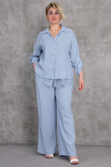  This product is a Plus Size womens Two-Piece Set in blue color. Size options include 42, 44, 46, and 48. The fabric composition consists of 65% Cotton, 30% Polyester, and 5% Elastane. The top part of the set features button details and lace embellishments, giving it an elegant appearance. With its comfortable cut and high-quality fabric, it is both stylish and comfortable. The pants have wide legs, providing freedom of movement. Suitable for casual use as well as special occasions.