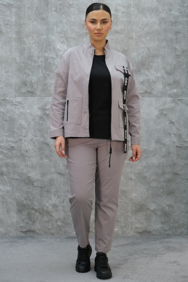  This excellent Plus Size Womens Sports Three-Piece Set offers a combination of comfort and style. With its grey color, you will feel comfortable and stylish in any setting. The product is available in sizes 42, 44, 46, and 48. The fabric, consisting of 75% cotton, 20% polyester, and 5% lycra, provides a comfortable wear and allows for freedom of movement. The zippered jacket, with front pockets and special design details, gives it a sporty look. The pants ensure daily comfort with their flexible structure. The inner shirt, with its breathable fabric, will be an ideal choice for your sports activities.