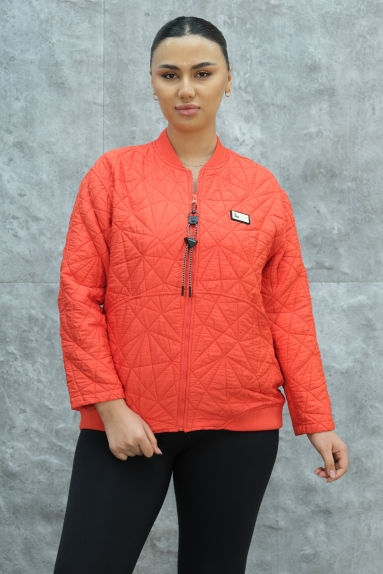  This beautiful plus-size womens short sport jacket in coral color combines style and comfort. The item is available in sizes 42, 44, 46, and 48, making it a suitable choice for all body types. Made from high-quality fabric containing 80% polyester and 20% cotton, it ensures both durability and comfort. The front side is adorned with a zipper detail and fine stitch work, adding a chic touch to the jacket. The back sides plain design makes it a perfect choice for those who prefer simplicity.
