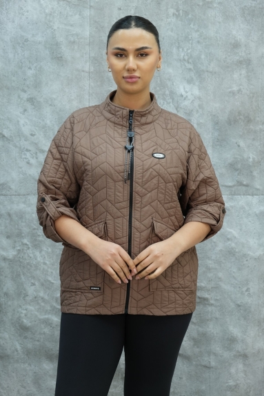  This short sports jacket is designed to provide a comfortable and stylish look. It is specially made for plus-size women and is available in brown color. The fabric content is 80% polyester and 20% cotton, which makes it both durable and comfortable. It features a high-neck design and a zip-up front closure. The sleeves can be rolled up and secured with buttons, and it has two large front pockets. Available in sizes 42, 44, 46, and 48.