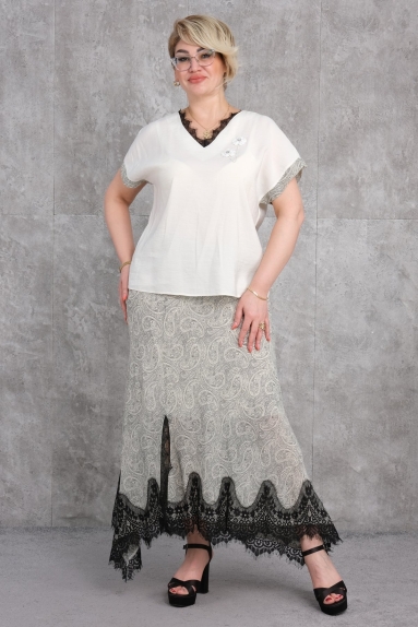  This product is a Plus Size womens Two-Piece Set. The color of the product is beige, and the available sizes are 42, 44, 46, and 48. The fabric content is 80% Polyester and 20% Cotton. The top piece features a V-neck design and short sleeves for comfortable wear. The bottom piece stands out with its elegant patterns and black lace details. It is an ideal choice both for daily use and special occasions.