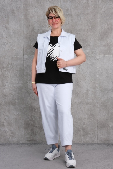  The model is wearing a plus-size Womens Sports Three-Piece Set. The color of the product is white, and the available sizes are 42, 44, 46, and 48. The fabric content is 75% Polyester, 20% Cotton, and 5% Lycra. The front view shows a black t-shirt with a white vest over it, paired with white trousers.