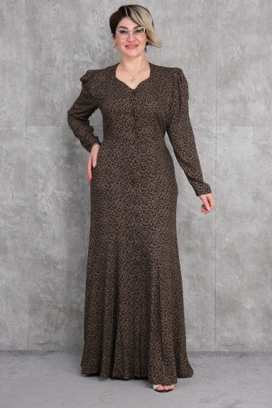  This product is a plus-size womens dress in beige. The available sizes are 42, 44, 46, and 48. The fabric is 100% cotton, featuring long sleeves and a flowing design. The front has button details and a V-neckline. On the back, there is a tie detail at the waist, which ensures a perfect fit and beautifully accentuates your body shape.