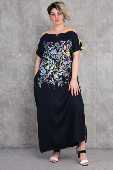  This plus-size womens dress stands out with its elegant and stylish design. The navy-colored dress offers a striking appearance, enhanced by the colorful floral patterns on the front. The colored strip details on the shoulder add a modern and trendy touch. With its comfortable cut, this dress promises comfort to the wearer and is made from 80% cotton and 20% polyester, making it both breathable and durable. Available in sizes 42, 44, 46, and 48.