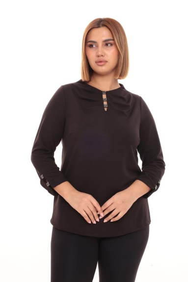  The plus size brown womens blouse features a stylish and comfortable design. It is very comfortable to wear, especially with a fabric content of 47% viscose, 47% polyester, and 6% lycra. The button accessories on the neck and sleeve details give the blouse an elegant look. Size options include 42, 44, 46, and 48. With its long sleeve design, it can be comfortably worn during seasonal transitions.